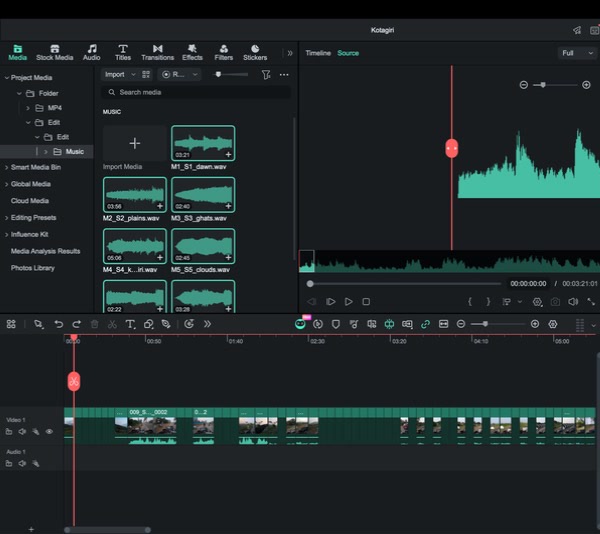 Filmora timeline with multiple music stems and the assembled motorcycle footage